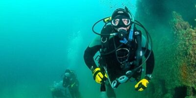 diver faces charges in dive buddy's death